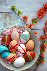Easter eggs on wooden background - 63720401