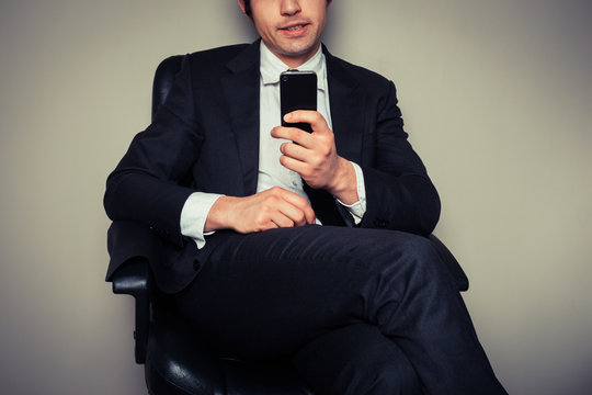 Businessman using smart phone