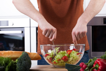 Man preparing salad