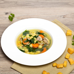 Vegetable soup with spinach and pasta