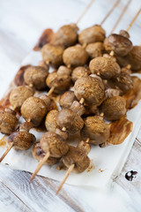 Close-up of baked champignons, vertical shot