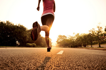 Runner athlete running on road