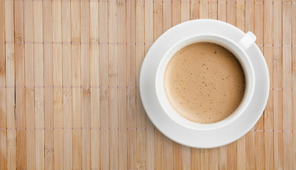 coffee cup on wooden table top view