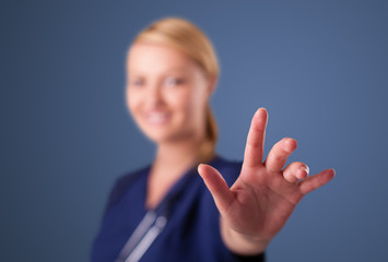 Young female doctor gesturing with copy space