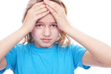 Kind mit Kopfschmerzen