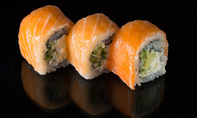 sushi over black background