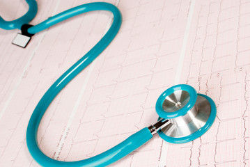 Stethoscope on an electrocardiogram (ECG) chart