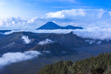 bromo and semeru mountain over the cloud