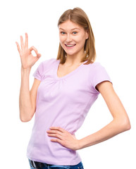 Woman is showing OK sign