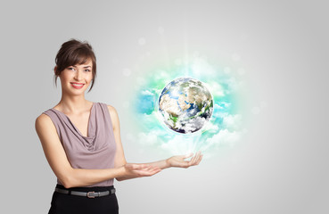 Young woman with earth and cloud concept
