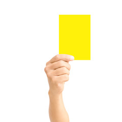 man hand holding yellow card