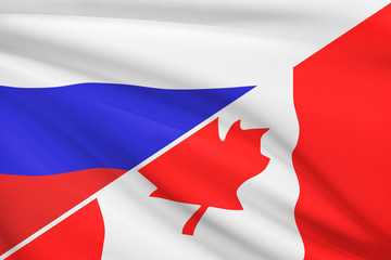 Series of ruffled flags. Russia and Canada