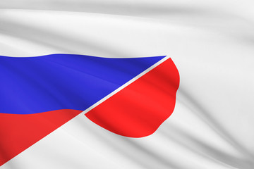 Series of ruffled flags. Russia and Japan.