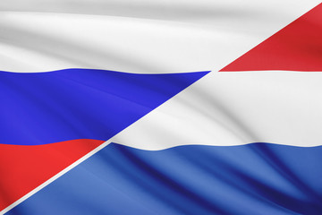 Series of ruffled flags. Russia and Netherlands.