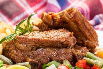 Pork spareribs served with mashed potatoes