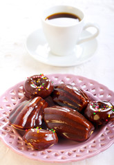 Small cakes, coated with chocolate