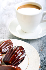 Small cakes, coated with chocolate
