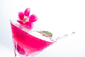 Cocktail with caviar and flower