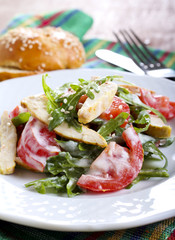 Chicken, rocket and tomato salad