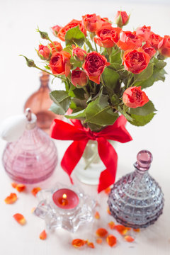 orange roses in vase