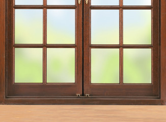 Wooden table and window and nature background