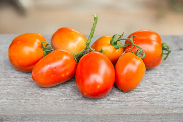 Tomatoes on wooden table