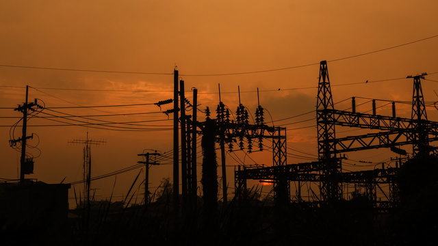Power substation at sunrise, time lapse