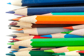 Colorful pencils. Horizontal macro photo background on white bac