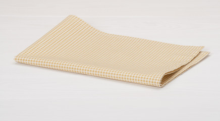 Natural Cotton Napkin On White Painted Wood Background