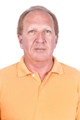 Handsome old man in orange polo-shirt