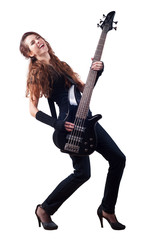 Beautiful girl with long red hair playing bass guitar