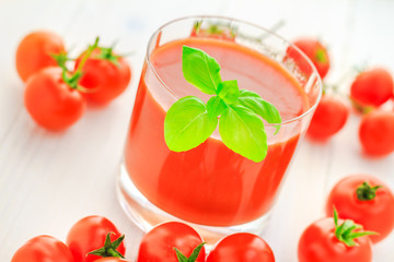 Healthy food juice red cherry tomatoes