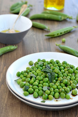 Salad of fresh peas with mint. Close-up.