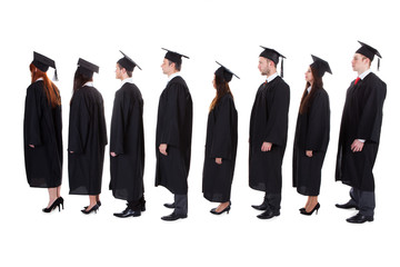 Graduate students standing in queue