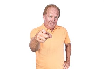 Handsome old man in orange polo-shirt pointing