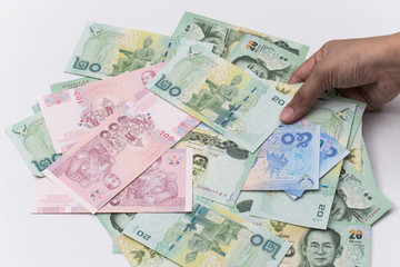 Thai bath close up of money with hand