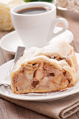 Slice of an apple strudel on the plate