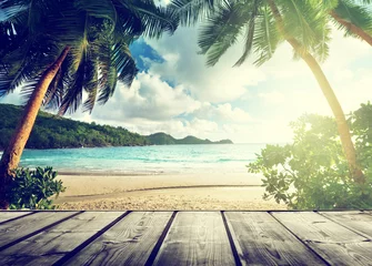 Tuinposter Pier Seychellen strand en houten pier