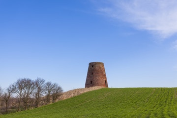 The brick tower destroyed of a windmill