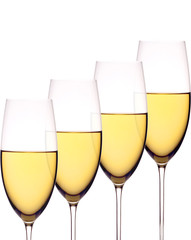 Wineglasses with white wine, isolated on white