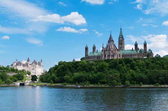 Canadian Parliament Hill viewed from across Ottawa river during