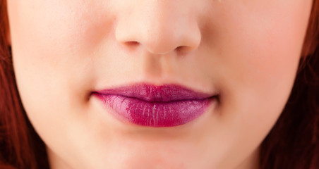 Fototapeta premium Beautiful woman red lips close up
