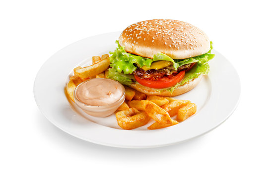 hamburger with fries and sauce on a white background