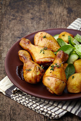 Roasted chicken legs and potatoes