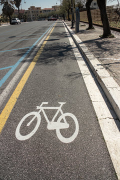 bike path with bike painted on asphalt