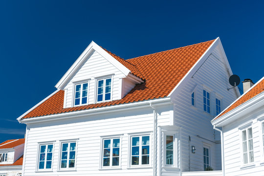 Traditional White Wooden House In Norway