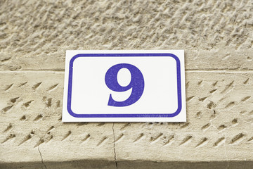 Number nine on a wall