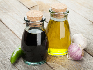 Olive oil and vinegar bottles with spices