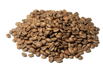 Heap of brown coffee beans isolated on white