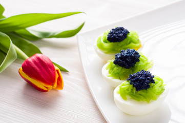 Eggs stuffed with caviar